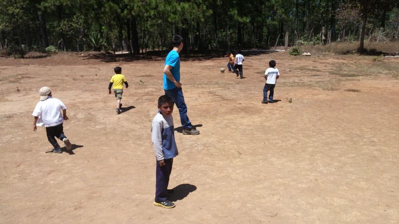 Playing soccer with the children 